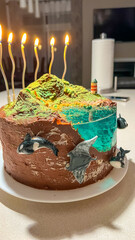 Ocean-themed homemade cake featuring vibrant decorations, playful marine creatures, and colorful frosting, perfect for celebrations and special occasions