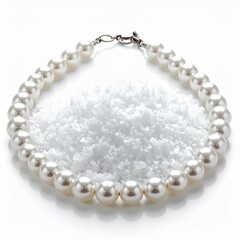 Fototapeta premium Elegant Pearl Necklace Adorning Pile of White Salt Against White Background