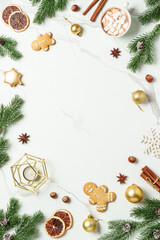 Gingerbread cookies with hot chocolate, spices and christmas decorations.