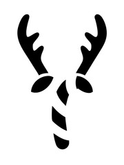 A close up view of a single perfectly ripe red strawberry with a green stem and leaves against a black background