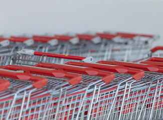 red carts emphasizing retail focus, pattern of red carts highlighting retail store environment with...
