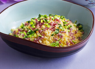 Delicious Fried Rice with ham, salted pork and fresh herbs featuring savory ham and fresh herbs. Perfect for culinary creations, restaurant menus, and food blog content
