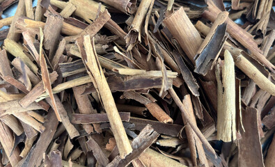 Broken Ceylon Cinnamon Textured Background, Cinnamomum Verum Bark Pieces Pattern
