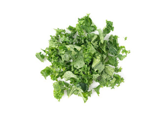 Fototapeta premium Pieces of kale cabbage leaves isolated. Green leaf of curly cabbage cooked for fresh salad