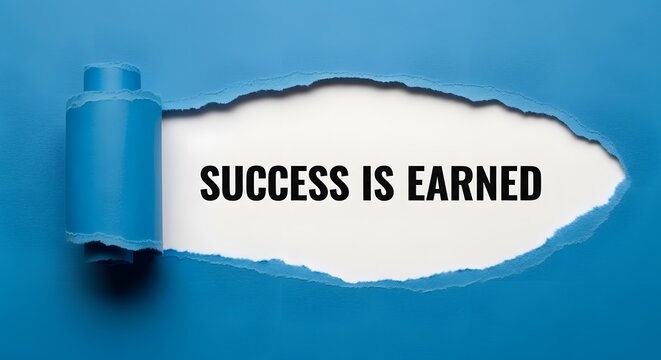 Inspiring message of success revealed through torn blue paper for motivational posters and business presentations that highlight hard work and dedication