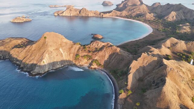 Drone view of Komodo archipelago highlighting coral reefs and untouched natural beauty