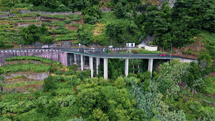 Aerial view cars riding at countryside. Asphalt roadway with hurrying transport
