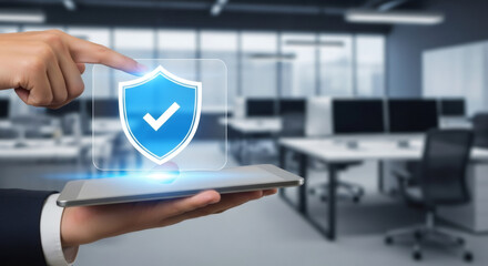 Man holding digital tablet with virtual blue shield and checkmark icon for online data protect, cybersecurity, and digital privacy concept