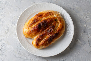 Turkish style meat stuffed filo dough borek served kol boregi.