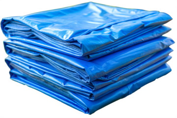 Stack of Folded Blue Tarps Durable Protection for Covering and Securing Objects