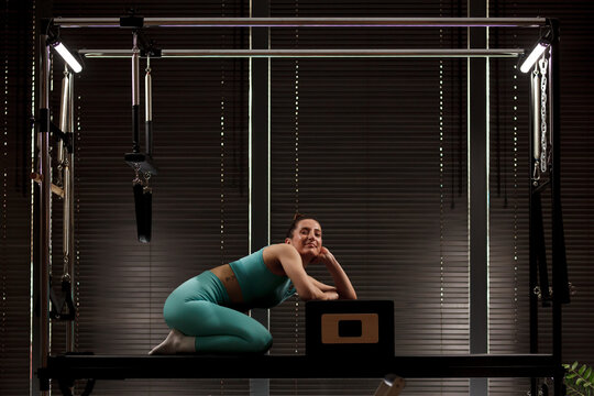 Exploring the benefits of reformer Pilates workout in a modern studio during a morning fitness session