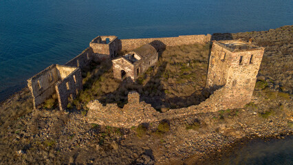 Historic ancient monastery on an island around the Patrica beach. Shooting with drone. (Turkish...
