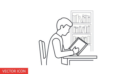 Person reading a book at a desk with bookshelves in the background. © lidot