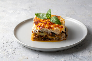 Traditional Greek potato and meat casserole with cheese - moussaka