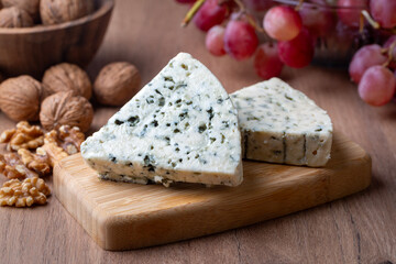 Sliced blue cheese - Roquefort cheese or gorgonzola cheese