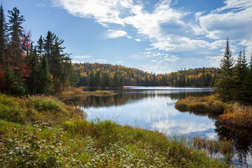 Small trout lake in northern Minnesota on a bright autumn afternoon