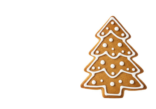 Gingerbread Christmas tree cookie isolated PNG, festive holiday treat on transparent background for seasonal designs