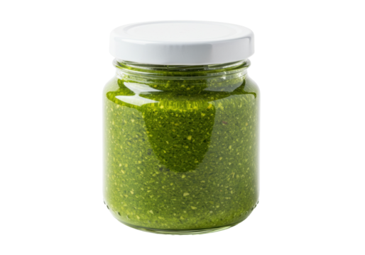 Fresh green pesto in glass jar isolated PNG, homemade Italian basil sauce for pasta and gourmet food preparation on transparent background