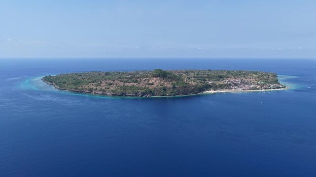 The beautiful island of Pulau Buaya, also known as Ternate, sits in Pantar Strait, near Alor, Indonesia. This area is known for its diverse coral reefs and spectacular scuba diving and snorkeling.