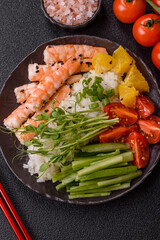A prawn or shrimp bowl with rice, tomatoes, sauce, and vegetables, Asian food. Prawn or shrimp
