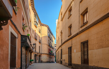 Calle del Codo (Elbow Street) with a bend  which is almost 90 degrees in Sol neighborhood. It is a short and narrow street from the Spanish Golden Age, beside Plaza de la Villa.
