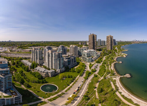 Aerial view of Mimico&rsquo;s waterfront epic cityscape. Summer vibes at Marine Parade and Lake Shore West. Chic condos with stunning lake views, vibrant park, and urban living in Etobicoke near Toronto.