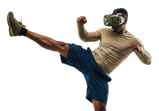 Athletic man wearing VR headset kicking isolated PNG, virtual reality fitness and gaming on transparent background