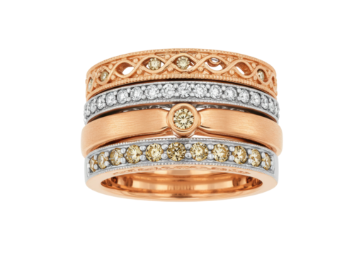 Stackable rose gold rings with diamonds isolated PNG, elegant jewelry set on transparent background for fashion and luxury designs