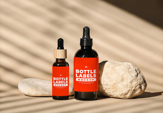 Close-up Dropper Bottles Mockup with Shells and Shadows for Cosmetic Labeling