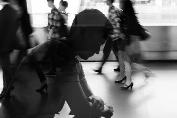 Man in crowded stressful environment dealing with social anxiety, depression, loneliness 