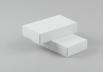 Two plain, white rectangular boxes are stacked on a neutral gray background.