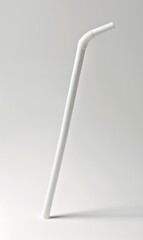 White bent drinking straw on blank surface, studio shot for commercial product use