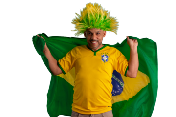 male fan wearing a yellow Brazilian football shirt and the Brazilian flag