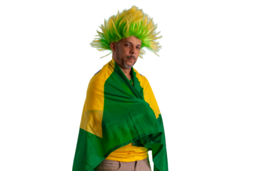 male fan wearing a yellow Brazilian football shirt and the Brazilian flag