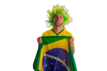 male fan wearing a yellow Brazilian football shirt and the Brazilian flag