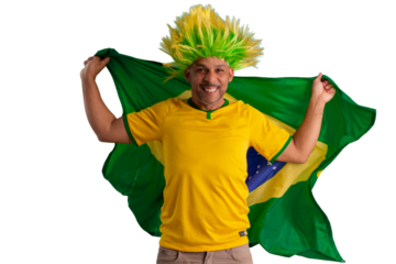 male fan wearing a yellow Brazilian football shirt and the Brazilian flag