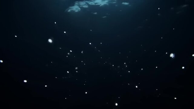 Abstract particle field on dark background with bokeh effect and copy space