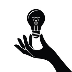 Silhouette of a hand holding a glowing light bulb representing an idea