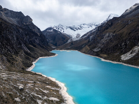 Huaraz, Peru:Aerial view of famous laguna paron in Caraz, Huaraz region, Peru, in the cordillera blanca and the Piramide peak in the back.