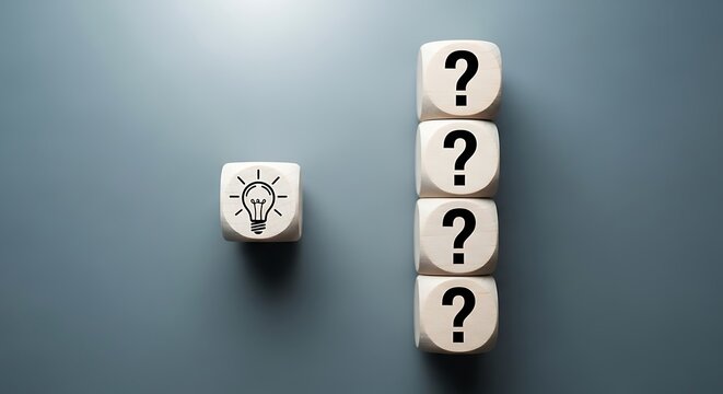 A single cube with a lightbulb symbol stands out from a stack of cubes with question marks on a blue background