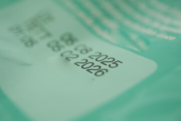 Product packaging shows expiration date labels