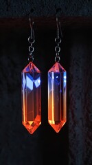 Stunning Neon Crystal Earrings Hanging in Soft Glow, Showcasing Vibrant Colors and Captivating Light Reflections, Perfect for Fashion or Art Projects
