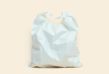 A crumpled white plastic grocery bag on a neutral background, background, object
