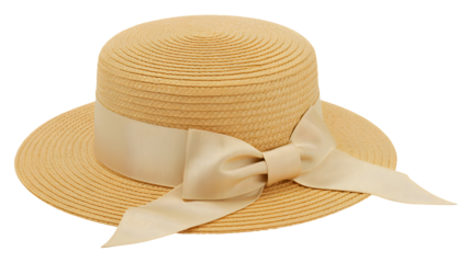 Stylish light brown woven straw sun hat with a wide cream ribbon bow detail isolated on transparent background