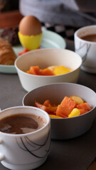 Traditional Colombian breakfast with fruits, bread, and coffee / Desayuno colombiano tradicional con frutas, pan y café