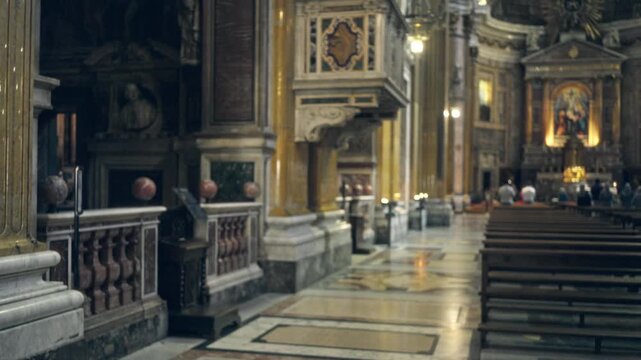 Blurred ornate marble church interior with shallow bokeh background; background backplate copyspace calm.