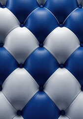 Obraz premium Elegant Diamond Pattern: A close-up showcases a luxurious upholstered surface, displaying a captivating diamond pattern, creating a texture and refined visual aesthetic.