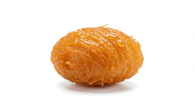 Isolated zalabia honey-soaked fritter on a white background for dessert or culinary use