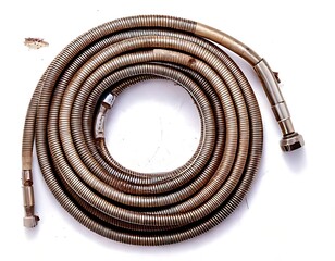 Coiled Metal Hose - Durable and Flexible Industrial Tubing.
