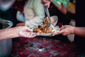 volunteers give food to local poor people, Feeding the poor Help them relieve hunger
